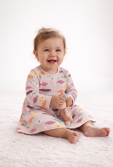 Sukienka dziewczęca z długim rękawem - w cukierki