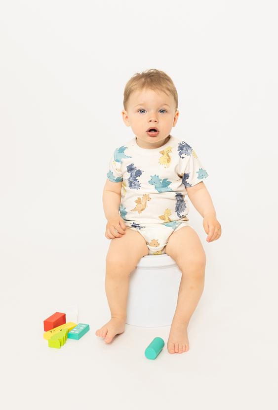 Body niemowlęce z krótkim rękawem - beżowe w smoki