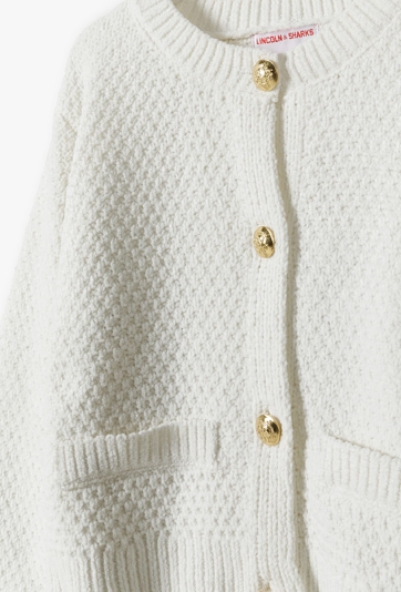 Elegancki sweter dziewczęcy ze złotymi guzikami