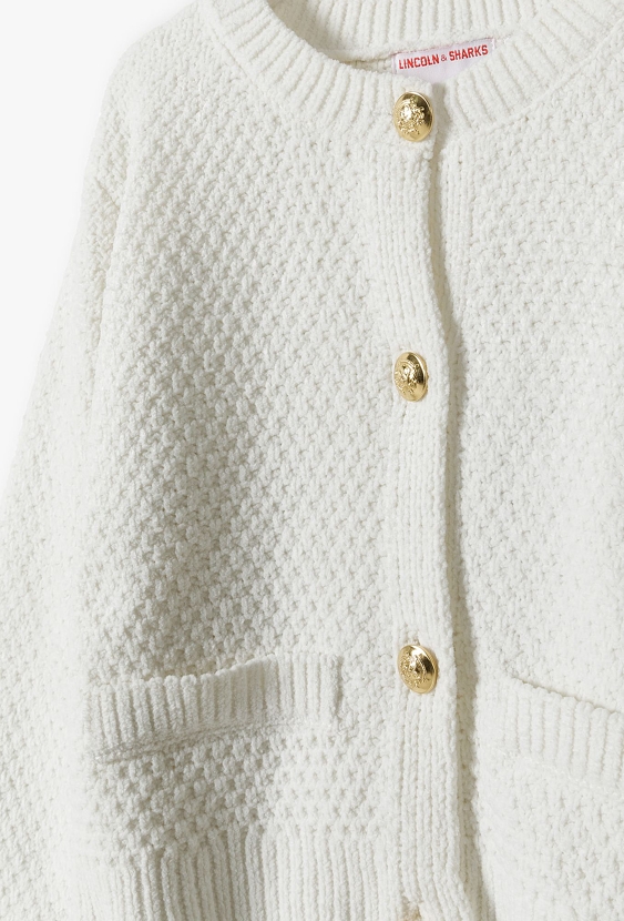 Elegancki sweter dziewczęcy ze złotymi guzikami