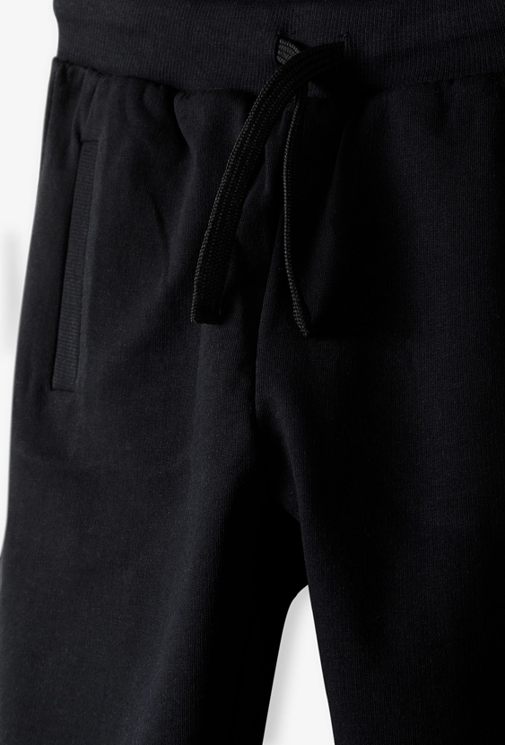 Czarne dresowe spodnie dla chłopca - 5.10.15.