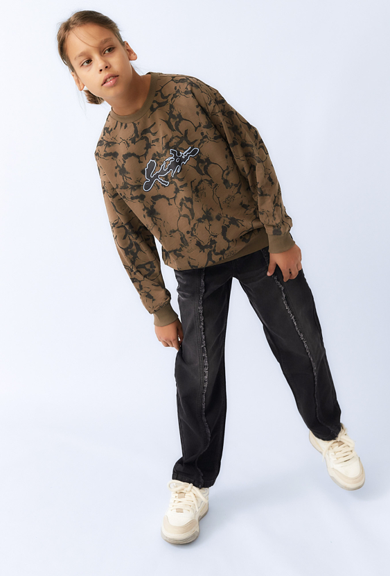 Czarne chłopięce spodnie jeansowe z przeszyciami