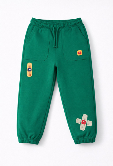 Spodnie dresowe chłopięce z printem plasterków