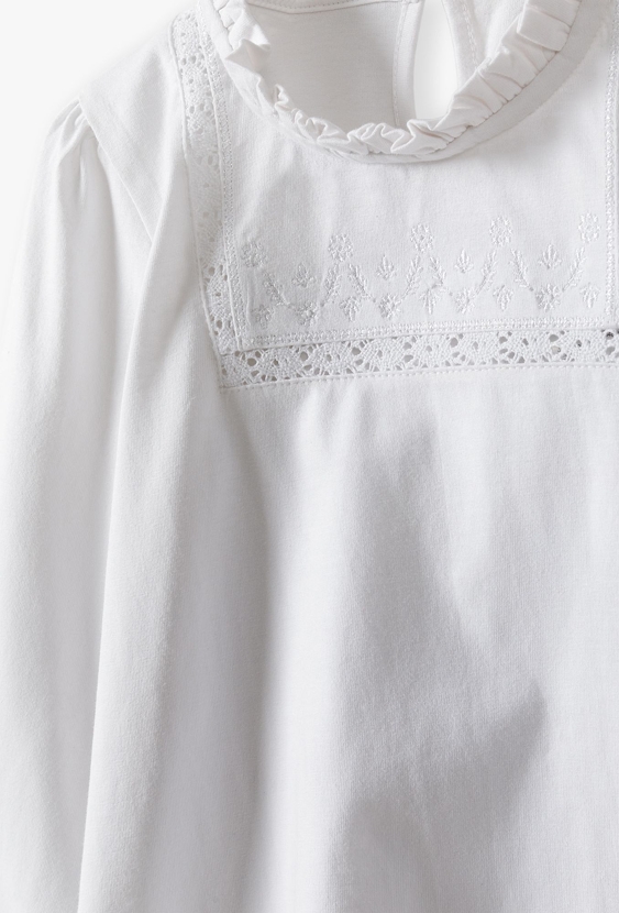 Biała elegancka bluzka z długim rękawem dla dziewczynki