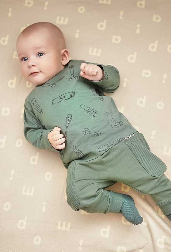 Zielona bawełniana bluzka niemowlęca we wzory