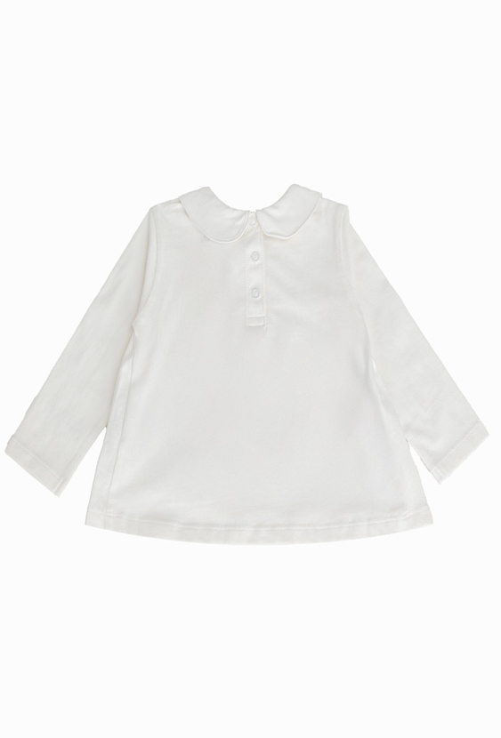 Biała bluzka dziewczęca z haftowanym kołnierzykiem.