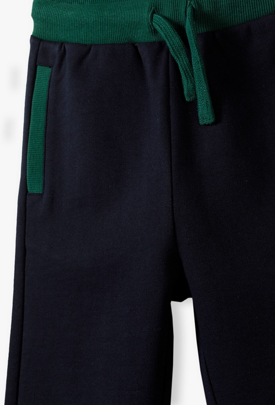 Granatowe spodnie dresowe z miękkiej dzianiny - 5.10.15.