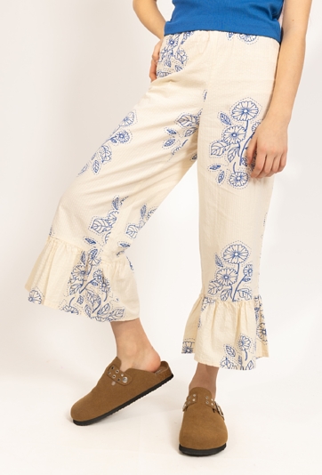 Dziewczęce spodnie z haftowanym motywem kwiatów