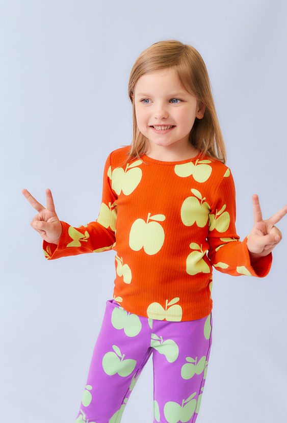 Pomarańczowa bluzka dziewczęca w jabłuszka