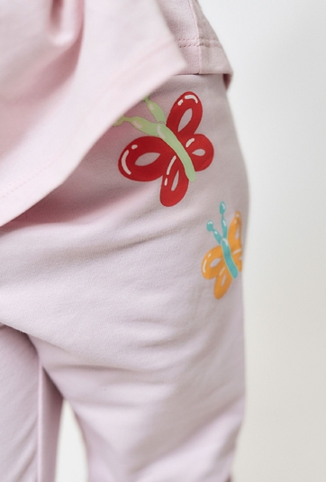 Jasnoróżowe legginsy  z motylkami