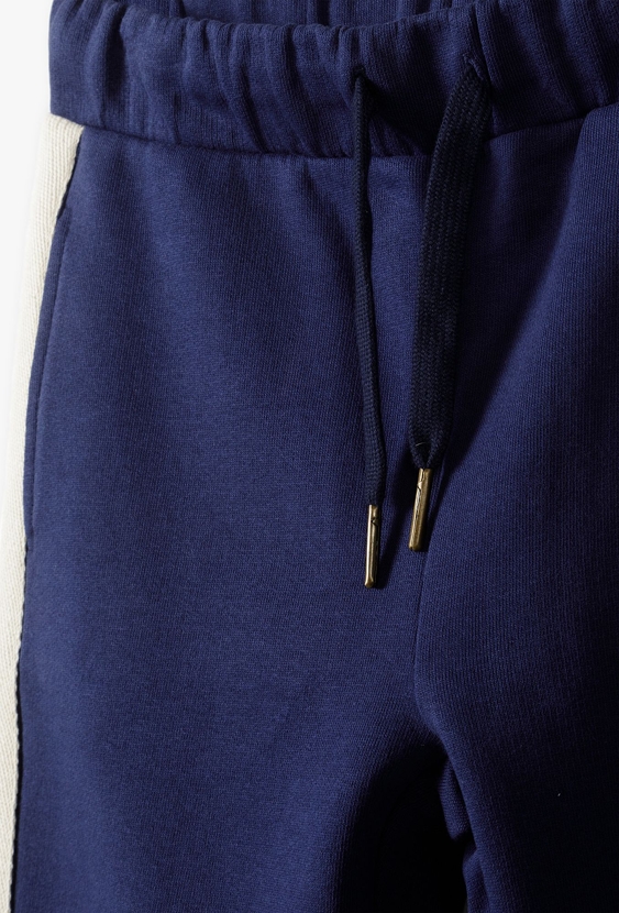 Granatowe spodnie dresowe z lampasami - Limited Edition