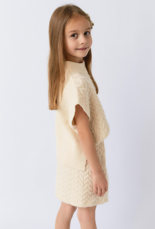 Spódnica dziewczęca swetrowa – ecru z warkoczowym splotem