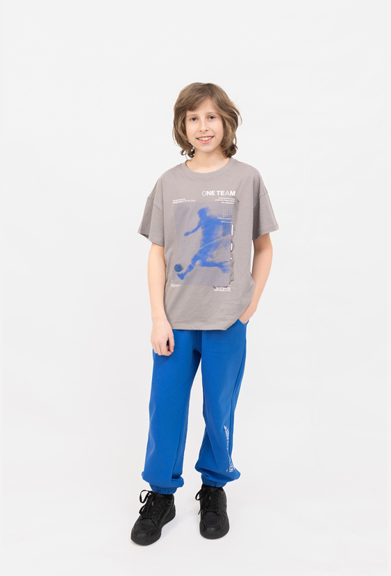 Spodnie dresowe chłopięce regular z nadrukiem na nogawce