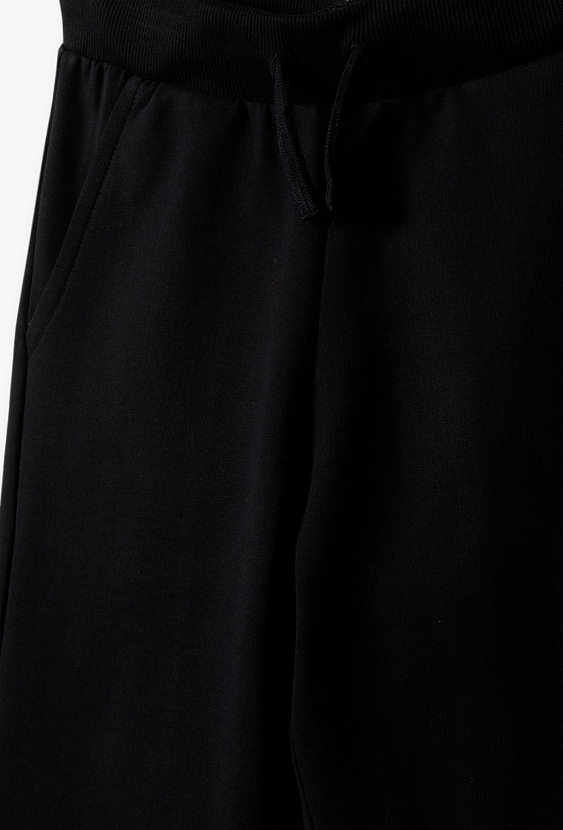 Spodnie dresowe dla chłopca - slim