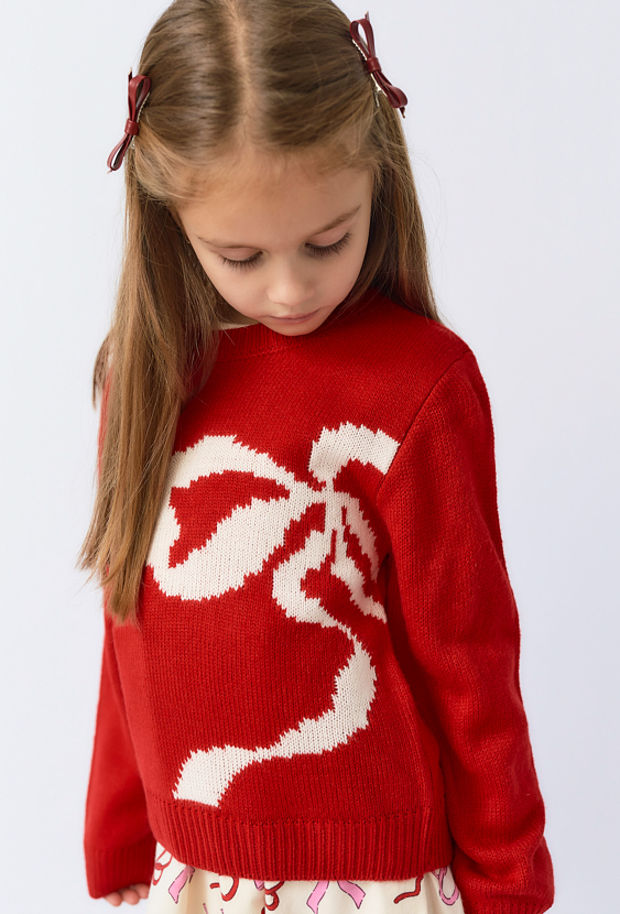Dziewczęcy czerwony sweter z kokardą