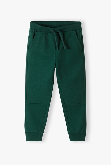 Spodnie dresowe w kolorze butelkowej zieleni - 5.10.15.