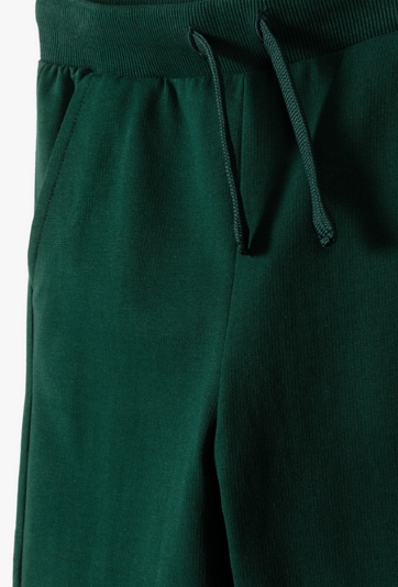 Spodnie dresowe w kolorze butelkowej zieleni - 5.10.15.