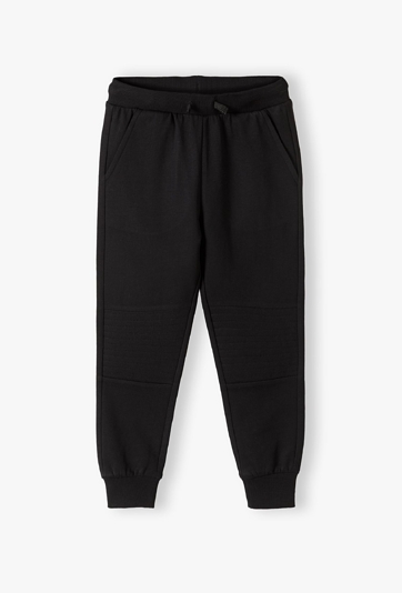 Czarne spodnie dresowe dla chłopca - slim - 5.10.15.