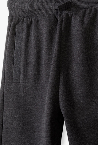 Grafitowe spodnie dresowe dla chłopca - slim - 5.10.15.