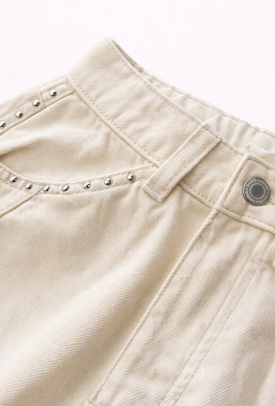 Dziewczęce jeansy z ozdobnymi nitami