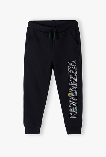 Granatowe spodnie dresowe dla chłopca - Gamechanger - 5.10.15.