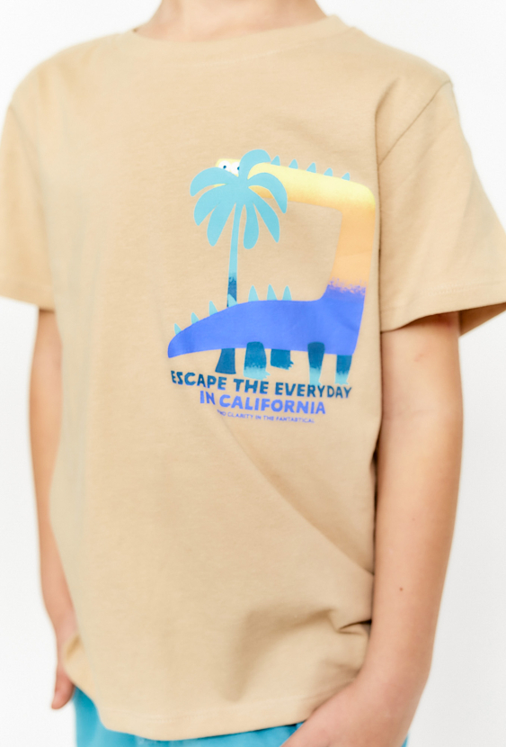 T-shirt chłopięcy z nadrukiem dinozaura - beżowy