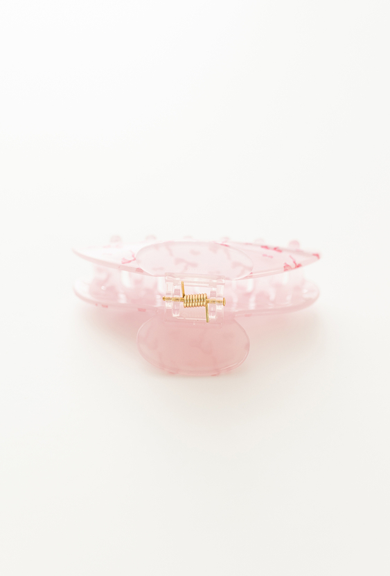 Różowa spinka do włosów z nadrukiem kokardek