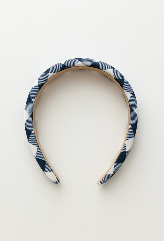 Granatowo-biała opaska w kratę dla dziewczynki.