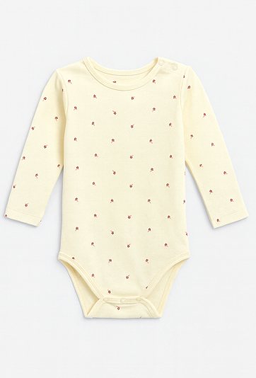 Jasnożółte body dziewczęce z długim rękawem i nadrukiem kwiatków