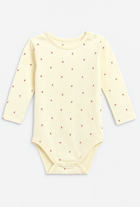 Jasnożółte body dziewczęce z długim rękawem i nadrukiem kwiatków