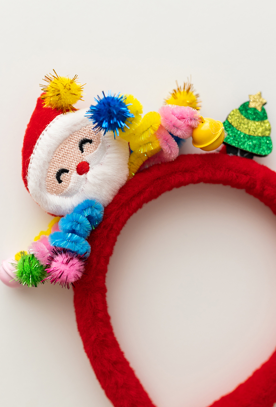 Świąteczna opaska dla dziewczynki z Mikołajem i choinką.