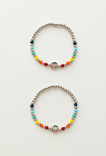 Zestaw bransoletek z kolorowych koralików z buźką – 2 szt