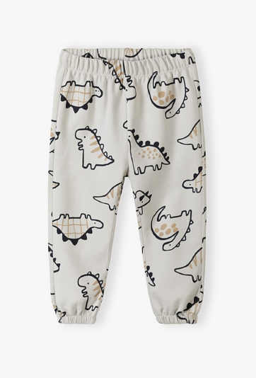 Spodnie dresowe niemowlęce - szare w dinozaury