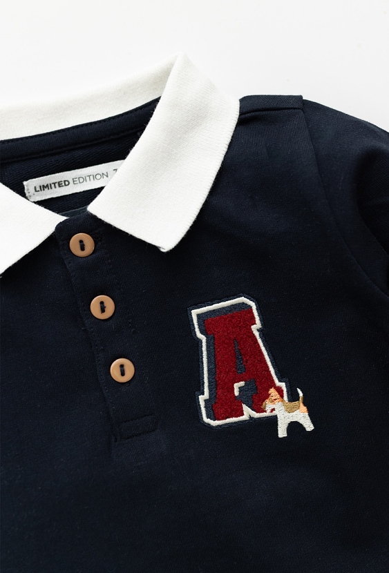 Granatowy pajacyk z kołnierzykiem