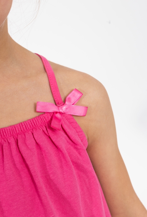 Dziewczęca sukienka na cienkich ramiączkach z falbanką