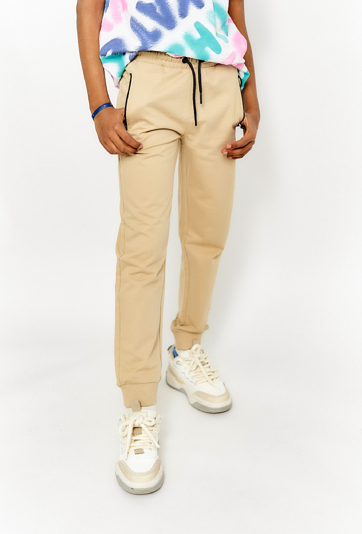 Spodnie dresowe dla chłopca regular - beżowe