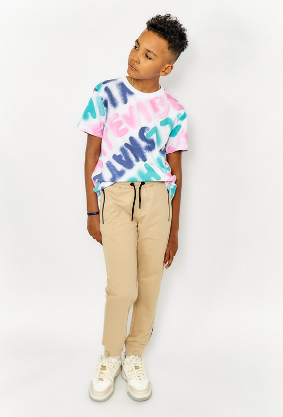 Spodnie dresowe dla chłopca regular - beżowe