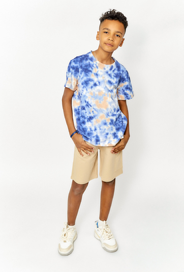 Chłopięce szorty dresowe - beżowe z boczną kieszenią